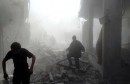Residents run amid dust from damaged buildings after what activists said was shelling by forces loyal to Syria's President Bashar al-Assad in the Damascus suburb of Saqba November 13, 2014. REUTERS/Msallam Abd Albaset (SYRIA - Tags: POLITICS CIVIL UNREST CONFLICT)