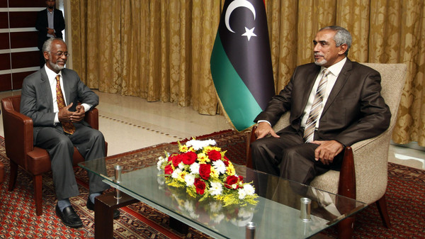 Libyan Prime Minister Omar al-Hassi meets with Sudanese Foreign Minister Ali Karti in Tripoli
