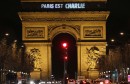 The message "Paris is Charlie" is projected on the Arc de Triomphe in Paris