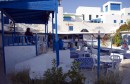 Tourists sit in a cafe of Sidi Bou Said