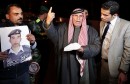 Yousef, father of Islamic State captive Jordanian pilot Kasaesbeh, reads a statement released by Islamic State during a demonstration to demand Jordanian government negotiate with Islamic State for release of Kasaesbah, in Amman