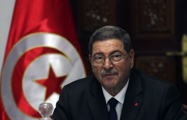 Tunisia's Prime Minister Habib Essid attends the first meeting of the new government at the government palace in Tunis