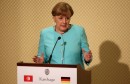 German Chancellor Angela Merkel speaks during a news conference with Tunisia's President Beji Caid Essebsi in Tunis