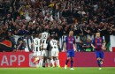 Juventus-Paulo-Dybala-celebrates-scoring-their-first-goal-with-team-mates-as-Barcelonas-Javier-Mas