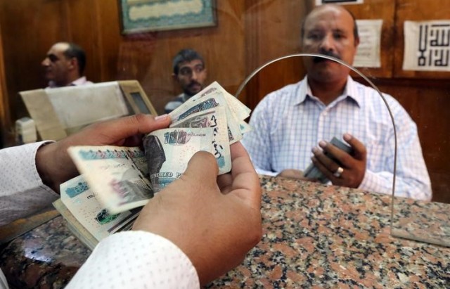 مصرفيون: بنوك مصرية تعيد التعامل على الريال القطري