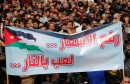 Protesters from the Islamic Action Front and others chant slogans during a protest in Amman