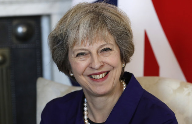 Britain's Prime Minister Theresa May smiles during a bilateral meeting with Colombia's President Juan Manuel Santos at 10 Downing Street in London