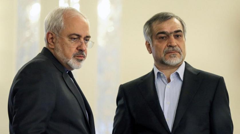 iranian_fm_mohamad_javad_zarif_l_stands_alongside_hossein_fereidoun_president_rouhanis_brother_and_advisor_during_a_press_conference_for_rouhani_in_tehran_in_april_2015._afp